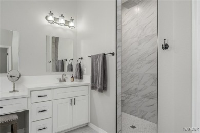This contemporary home is located in the beautiful and gated Los on Los Lagos Golf Club in Arizona - for sale on GolfHomes.com, golf home, golf lot