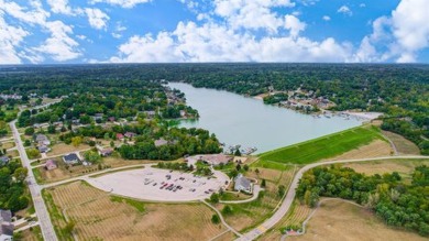 Have you always wanted a lake home? This beautiful brick 2-story on Hidden Valley Golf Club in Indiana - for sale on GolfHomes.com, golf home, golf lot