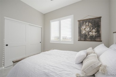 This contemporary home is located in the beautiful and gated Los on Los Lagos Golf Club in Arizona - for sale on GolfHomes.com, golf home, golf lot