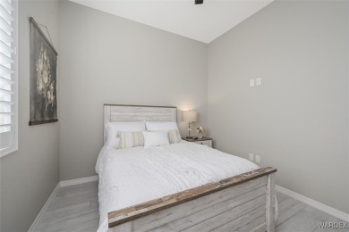 This contemporary home is located in the beautiful and gated Los on Los Lagos Golf Club in Arizona - for sale on GolfHomes.com, golf home, golf lot