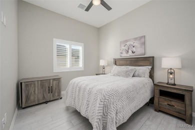 This contemporary home is located in the beautiful and gated Los on Los Lagos Golf Club in Arizona - for sale on GolfHomes.com, golf home, golf lot