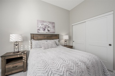 This contemporary home is located in the beautiful and gated Los on Los Lagos Golf Club in Arizona - for sale on GolfHomes.com, golf home, golf lot