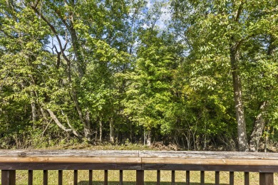 Sitting in the scenic Woodlawn Estates community along Lake on Peninsula Golf Resort in Kentucky - for sale on GolfHomes.com, golf home, golf lot