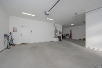 This contemporary home is located in the beautiful and gated Los on Los Lagos Golf Club in Arizona - for sale on GolfHomes.com, golf home, golf lot