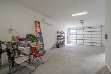 This contemporary home is located in the beautiful and gated Los on Los Lagos Golf Club in Arizona - for sale on GolfHomes.com, golf home, golf lot