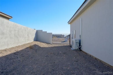 This contemporary home is located in the beautiful and gated Los on Los Lagos Golf Club in Arizona - for sale on GolfHomes.com, golf home, golf lot