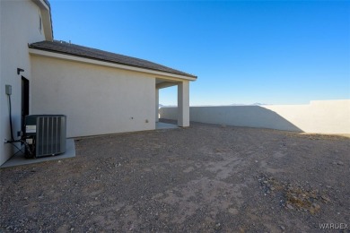 This contemporary home is located in the beautiful and gated Los on Los Lagos Golf Club in Arizona - for sale on GolfHomes.com, golf home, golf lot