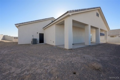 This contemporary home is located in the beautiful and gated Los on Los Lagos Golf Club in Arizona - for sale on GolfHomes.com, golf home, golf lot