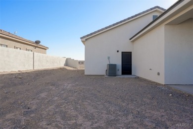 This contemporary home is located in the beautiful and gated Los on Los Lagos Golf Club in Arizona - for sale on GolfHomes.com, golf home, golf lot