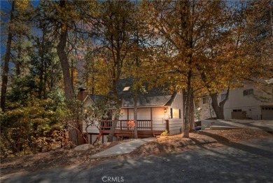 Escape to this stunning 4-bedroom, 3-bathroom mountain cabin on Lake Arrowhead Country Club in California - for sale on GolfHomes.com, golf home, golf lot