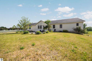 This stunning 4-bedroom, 3-bath custom ranch offers over 3,400 on Emerald Vale Golf Club in Michigan - for sale on GolfHomes.com, golf home, golf lot
