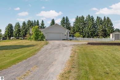 This stunning 4-bedroom, 3-bath custom ranch offers over 3,400 on Emerald Vale Golf Club in Michigan - for sale on GolfHomes.com, golf home, golf lot