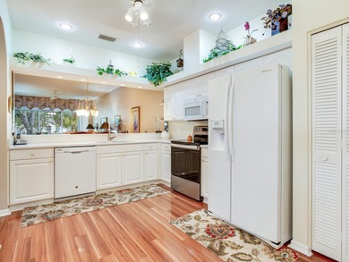 Must See This Stunning single-story end unit featuring 2 on Tara Golf and Country Club in Florida - for sale on GolfHomes.com, golf home, golf lot