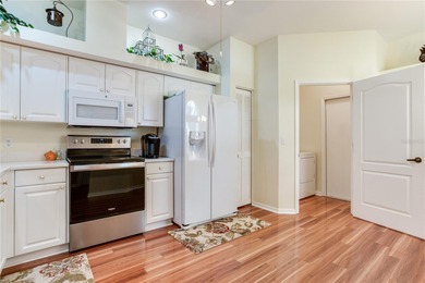 Must See This Stunning single-story end unit featuring 2 on Tara Golf and Country Club in Florida - for sale on GolfHomes.com, golf home, golf lot