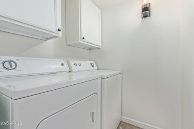 Lovely 2-story townhome with 2 bedrooms, 1.5 baths.  Kitchen on Raven Golf Club At South Mountain in Arizona - for sale on GolfHomes.com, golf home, golf lot