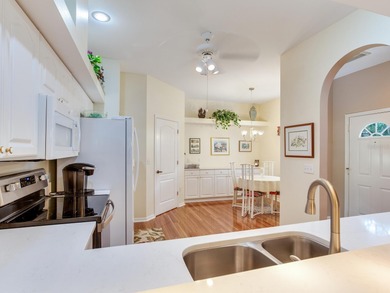 Must See This Stunning single-story end unit featuring 2 on Tara Golf and Country Club in Florida - for sale on GolfHomes.com, golf home, golf lot