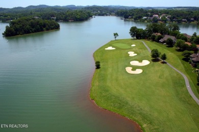 Beautifully remodeled four-bedroom home with a three-car garage on Tellico Village -The Links At Kahite Golf Course in Tennessee - for sale on GolfHomes.com, golf home, golf lot