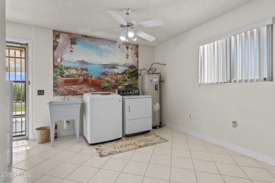 This oversized 2 bed / 2 bath home sits on an 18,000+ sq ft on Pebblebrook Golf Course in Arizona - for sale on GolfHomes.com, golf home, golf lot