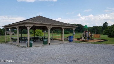 Beautifully remodeled four-bedroom home with a three-car garage on Tellico Village -The Links At Kahite Golf Course in Tennessee - for sale on GolfHomes.com, golf home, golf lot