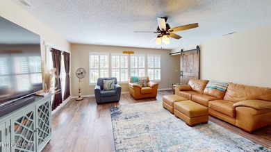 Main level boast upgraded kitchen with granite countertops, tile on Tellico Village -The Links At Kahite Golf Course in Tennessee - for sale on GolfHomes.com, golf home, golf lot