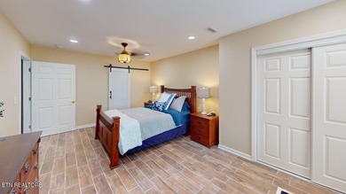 Main level boast upgraded kitchen with granite countertops, tile on Tellico Village -The Links At Kahite Golf Course in Tennessee - for sale on GolfHomes.com, golf home, golf lot