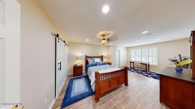 Main level boast upgraded kitchen with granite countertops, tile on Tellico Village -The Links At Kahite Golf Course in Tennessee - for sale on GolfHomes.com, golf home, golf lot