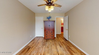 Main level boast upgraded kitchen with granite countertops, tile on Tellico Village -The Links At Kahite Golf Course in Tennessee - for sale on GolfHomes.com, golf home, golf lot