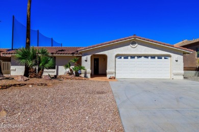 Welcome to 701 Paseo Granada!  This fully furnished pool home is on London Bridge Golf Course in Arizona - for sale on GolfHomes.com, golf home, golf lot