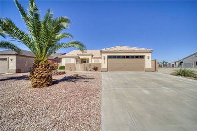 Welcome to your waterfront retreat in the highly sought-after on Los Lagos Golf Club in Arizona - for sale on GolfHomes.com, golf home, golf lot