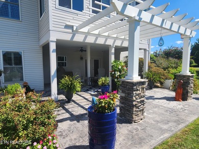 Main level boast upgraded kitchen with granite countertops, tile on Tellico Village -The Links At Kahite Golf Course in Tennessee - for sale on GolfHomes.com, golf home, golf lot