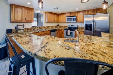 Welcome to 701 Paseo Granada!  This fully furnished pool home is on London Bridge Golf Course in Arizona - for sale on GolfHomes.com, golf home, golf lot
