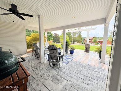 Main level boast upgraded kitchen with granite countertops, tile on Tellico Village -The Links At Kahite Golf Course in Tennessee - for sale on GolfHomes.com, golf home, golf lot