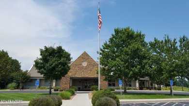 Main level boast upgraded kitchen with granite countertops, tile on Tellico Village -The Links At Kahite Golf Course in Tennessee - for sale on GolfHomes.com, golf home, golf lot