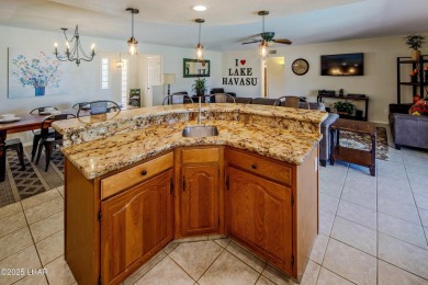 Welcome to 701 Paseo Granada!  This fully furnished pool home is on London Bridge Golf Course in Arizona - for sale on GolfHomes.com, golf home, golf lot