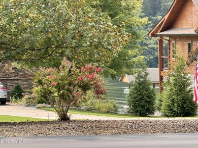 Main level boast upgraded kitchen with granite countertops, tile on Tellico Village -The Links At Kahite Golf Course in Tennessee - for sale on GolfHomes.com, golf home, golf lot