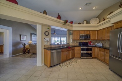 Welcome to your waterfront retreat in the highly sought-after on Los Lagos Golf Club in Arizona - for sale on GolfHomes.com, golf home, golf lot