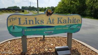 Main level boast upgraded kitchen with granite countertops, tile on Tellico Village -The Links At Kahite Golf Course in Tennessee - for sale on GolfHomes.com, golf home, golf lot