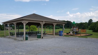 Main level boast upgraded kitchen with granite countertops, tile on Tellico Village -The Links At Kahite Golf Course in Tennessee - for sale on GolfHomes.com, golf home, golf lot