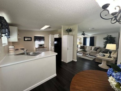 PRICE REDUCED TO $89,900! Welcome to this charming two bed, two on Four Lakes Golf Club in Florida - for sale on GolfHomes.com, golf home, golf lot