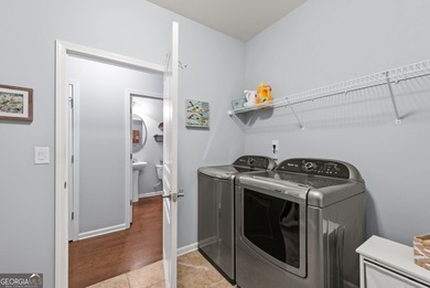 Welcome home to this beautifully maintained Dunwoody plan, one on Canongate Golf At Sun City Peachtree in Georgia - for sale on GolfHomes.com, golf home, golf lot