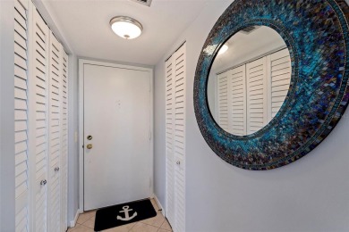 An abundance of natural light and updates in this welcoming on Isla Del Sol Yacht and Country Club in Florida - for sale on GolfHomes.com, golf home, golf lot
