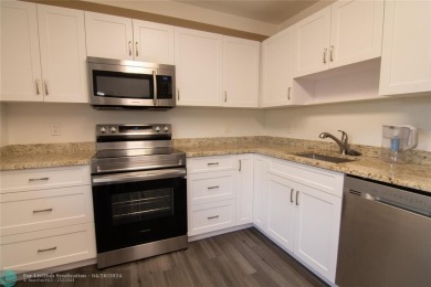 Totally Updated Unit, Freshly Painted, New Kitchen Cabinets and on Palm-Aire Country Club and Resort - The Oaks in Florida - for sale on GolfHomes.com, golf home, golf lot