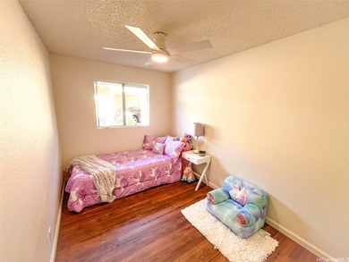 Welcome to this charming 4-bedroom, 2-bath home nestled in a on Mililani Golf Club in Hawaii - for sale on GolfHomes.com, golf home, golf lot