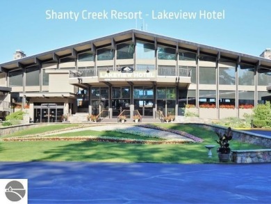 This is an easy to find property on the corner of Bogey Run and on Shanty Creek Golf Course in Michigan - for sale on GolfHomes.com, golf home, golf lot
