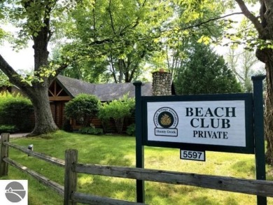 This is an easy to find property on the corner of Bogey Run and on Shanty Creek Golf Course in Michigan - for sale on GolfHomes.com, golf home, golf lot
