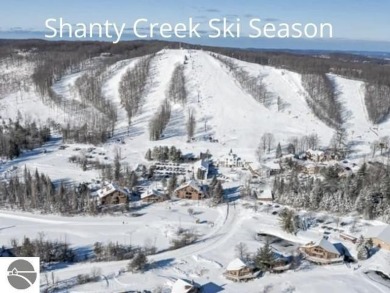 This is an easy to find property on the corner of Bogey Run and on Shanty Creek Golf Course in Michigan - for sale on GolfHomes.com, golf home, golf lot
