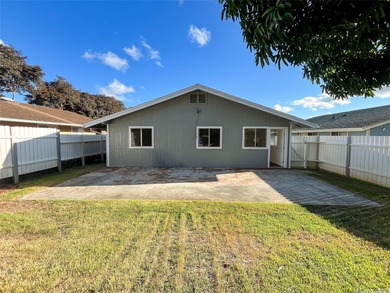 Welcome to this charming 4-bedroom, 2-bath home nestled in a on Mililani Golf Club in Hawaii - for sale on GolfHomes.com, golf home, golf lot