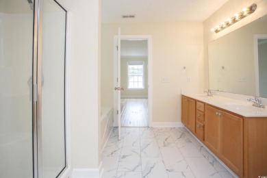Are you looking for a two-story home in Murrells Inlet? 112 on Indigo Creek Golf Club in South Carolina - for sale on GolfHomes.com, golf home, golf lot