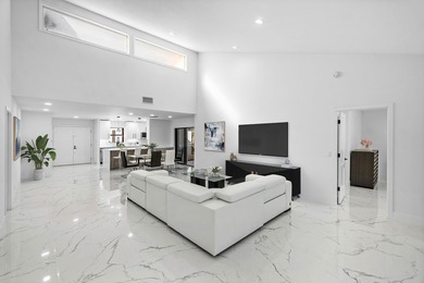 Photos virtually staged. Rare opportunity to own a completely on Hunters Run Golf and Country Club in Florida - for sale on GolfHomes.com, golf home, golf lot