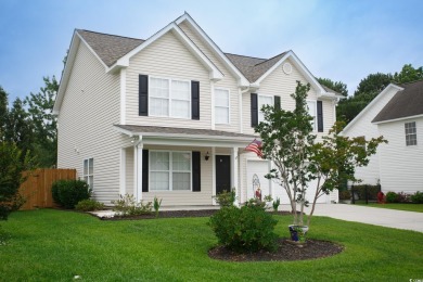 Are you looking for a two-story home in Murrells Inlet? 112 on Indigo Creek Golf Club in South Carolina - for sale on GolfHomes.com, golf home, golf lot